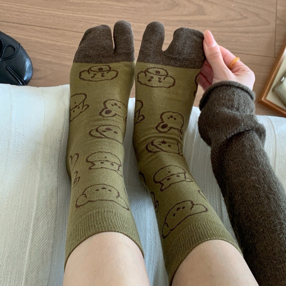 Hondenillustratie Tabi Split-T - Toe Sock Split recensie en prijs